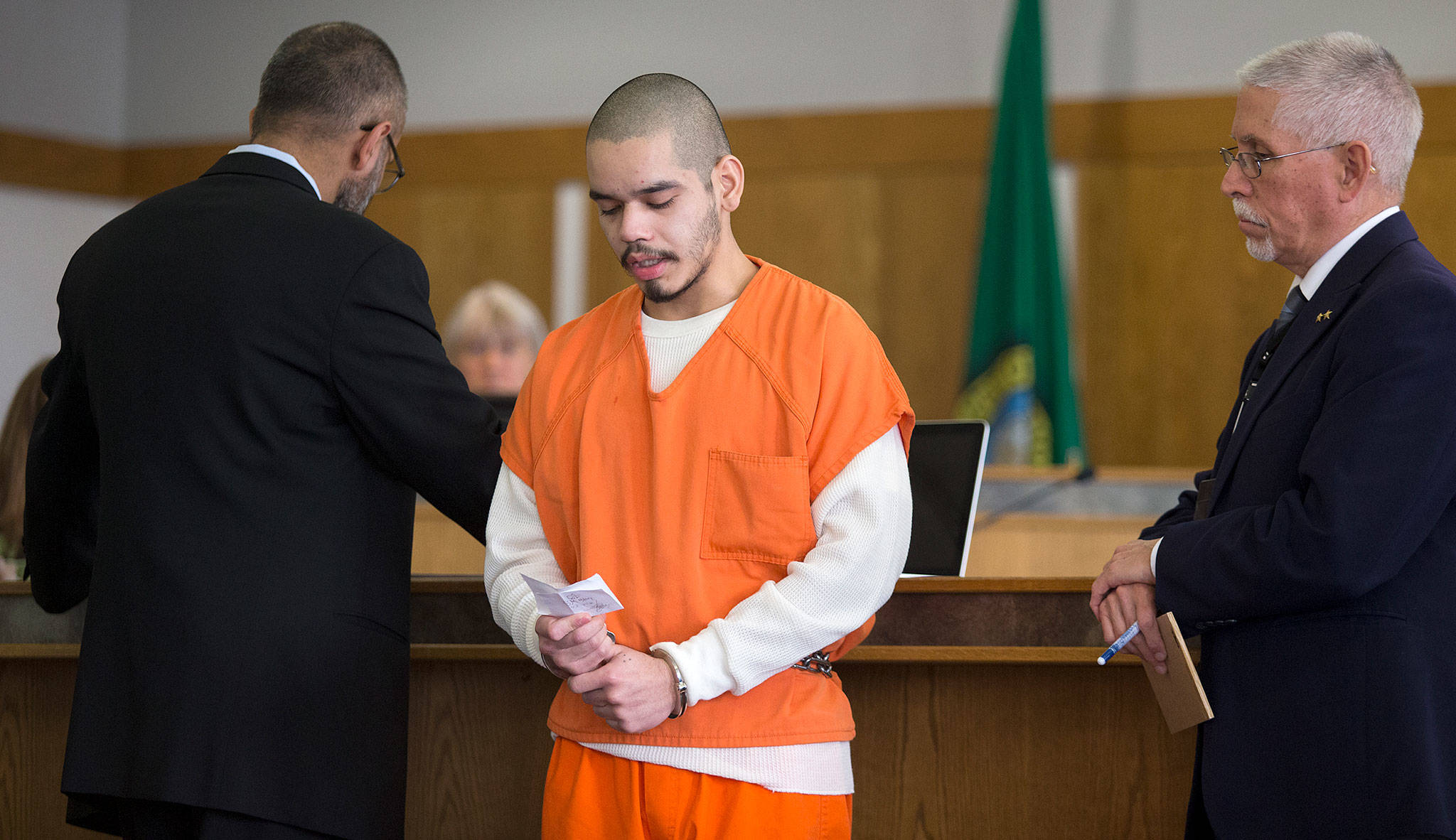 Anthony Hernandez-Cano reads a letter to the families of the two men he tortured and killed in July. A judge sentenced him to life in prison at the Snohomish County Courthouse on Tuesday in Everett. (Andy Bronson / The Herald)