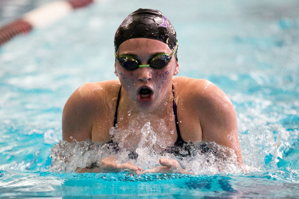 Kamiak’s Ava Collinge competes in the 200-yard IM at Kamiak High School on Oct. 18. (Kevin Clark / The Herald)
