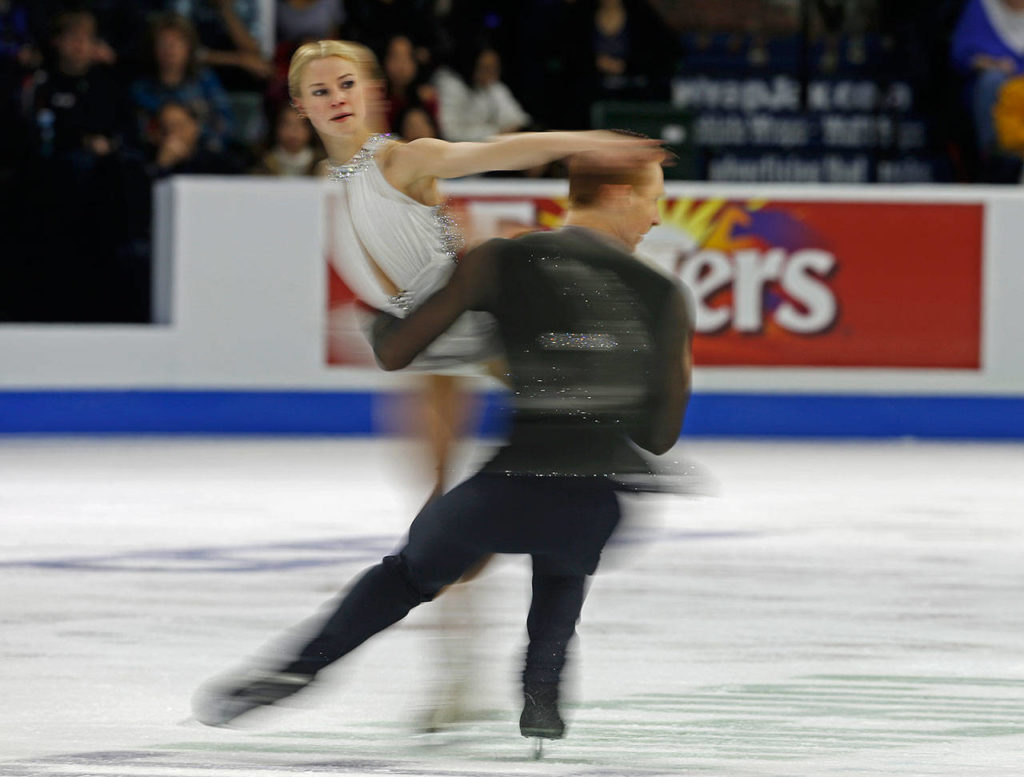 Evgenia Tarasova and Vladimir Morozov perform during the pair’s free skating program at Skate America, Friday, Oct. 19, 2018, in Everett, Wash. (Olivia Vanni / The Herald)
