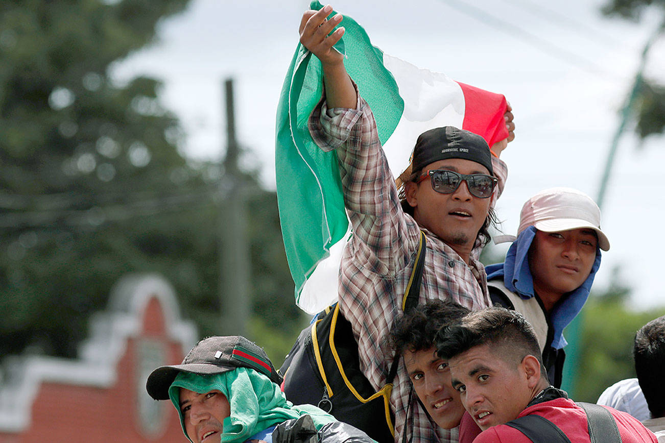 Growing caravan of migrants grows after push into Mexico