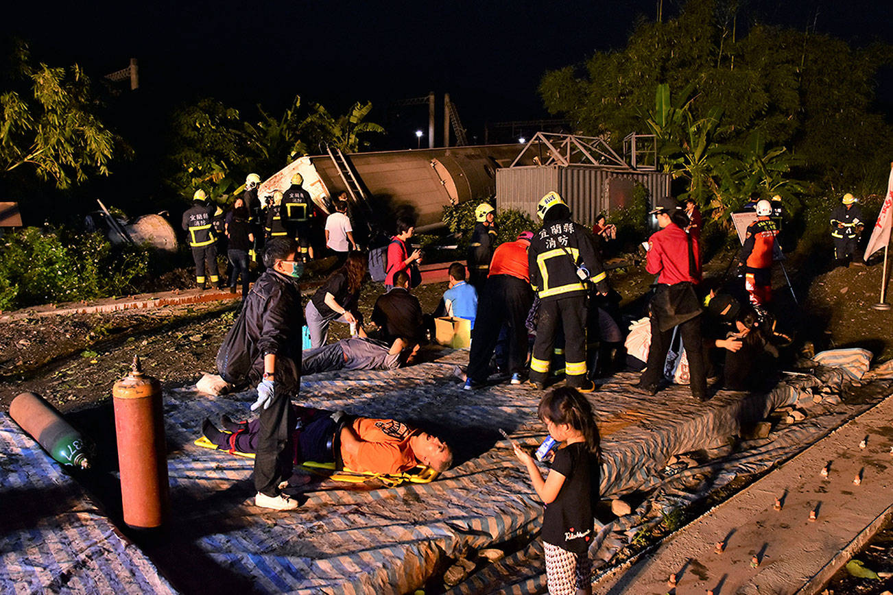 One of Taiwan’s fastest trains derails, killing at least 18