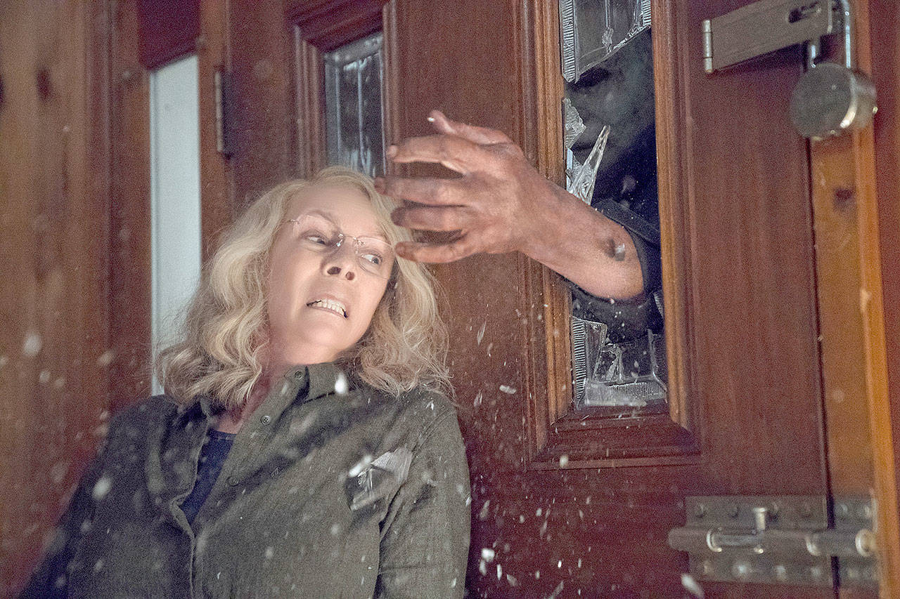 Returning to her iconic role as Laurie Strode in the sequel to “Halloween,” Jamie Lee Curtis owned the box office in the film’s opening weekend. (Universal Pictures)