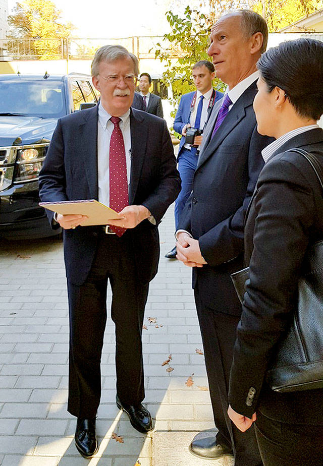 U.S. National Security Adviser John Bolton (left) and Russian Security Council chairman Nikolai Patrushev, prior their official talks in Moscow on Monday. (Press Service of the Russian Security Council via AP)
