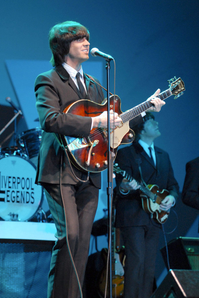 Marty Scott, a Chicago native, portrays the late George Harrison in Liverpool Legends. (Liverpool Legends)
