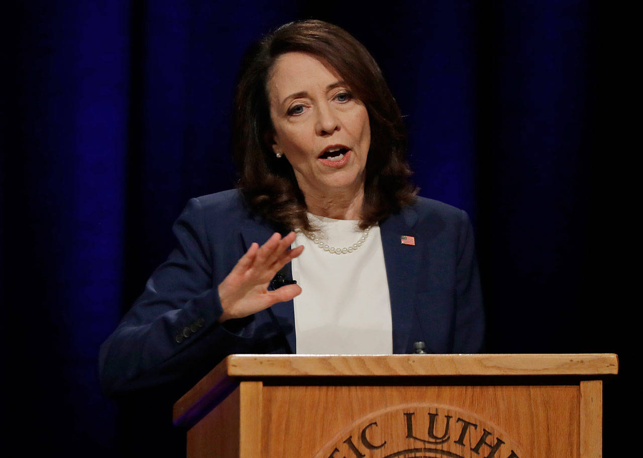 Sen. Maria Cantwell, D-Washington, takes part in a debate with her Republican challenger, Susan Hutchison, Oct. 8, at Pacific Lutheran University in Tacoma. (Ted S. Warren / Associated Press)