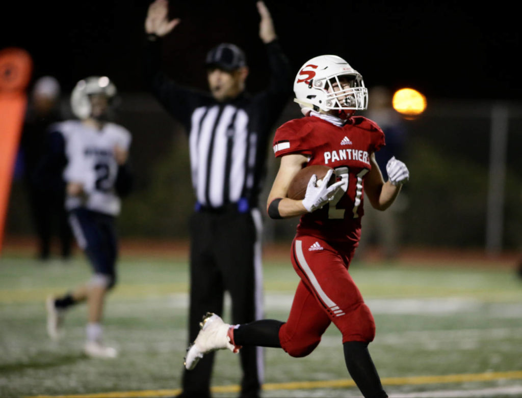 Snohomish’s Tyler Massena runs in for a touchdown during the Panthers’ 30-27 win over Squalicum on Fridayat Veterans Memorial Stadium in Snohomish. (Andy Bronson / The Herald)
