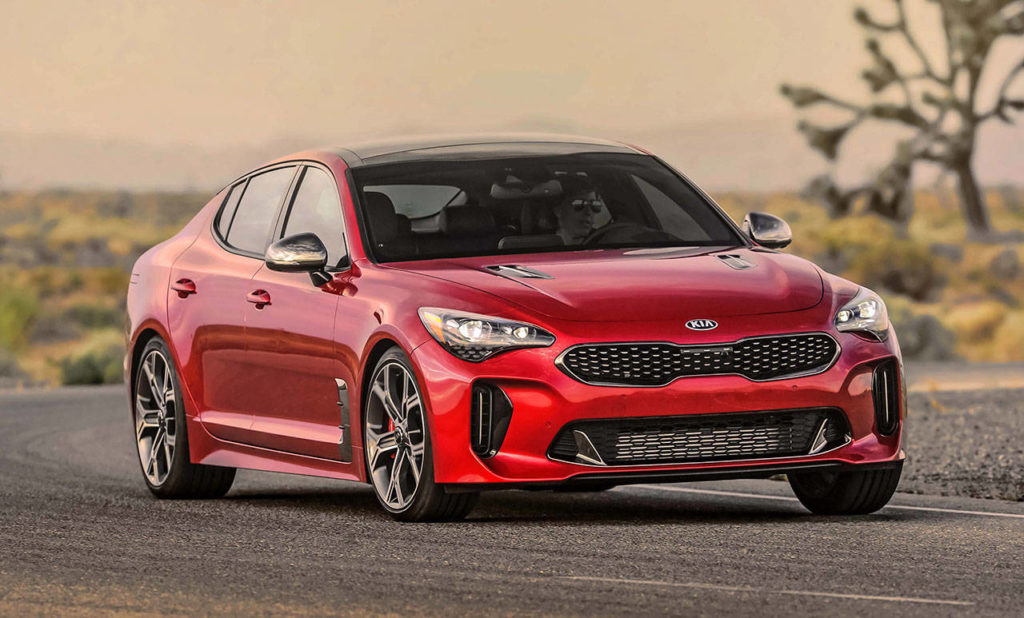 A long hood, short front overhang and steeply raked windshield help give the 2018 Kia Stinger a commanding presence. (Manufacturer photo)
