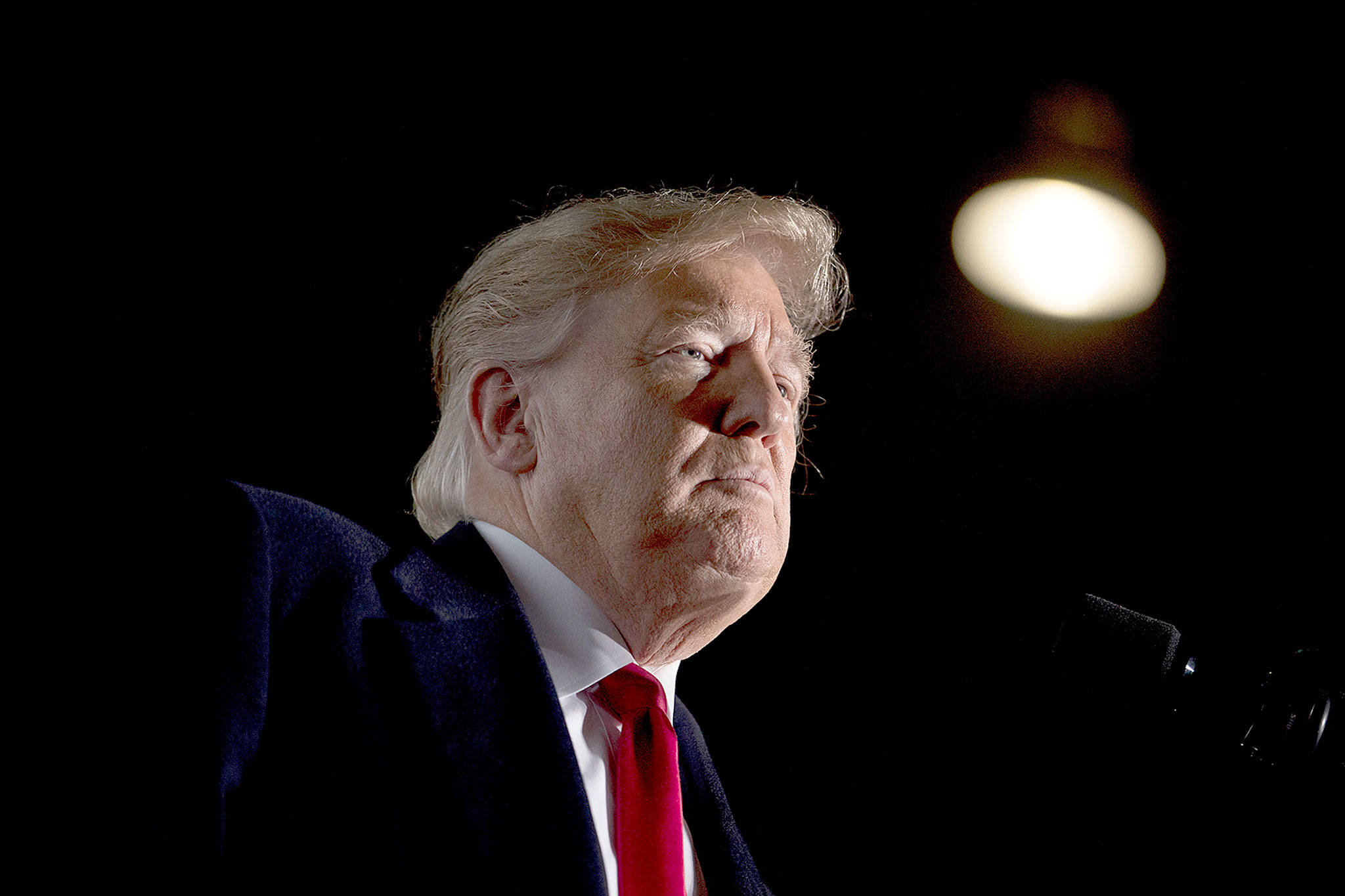 President Donald Trump pauses while speaking at a rally at Southern Illinois Airport in Murphysboro, Illinois, on Saturday. (AP Photo/Andrew Harnik, File)