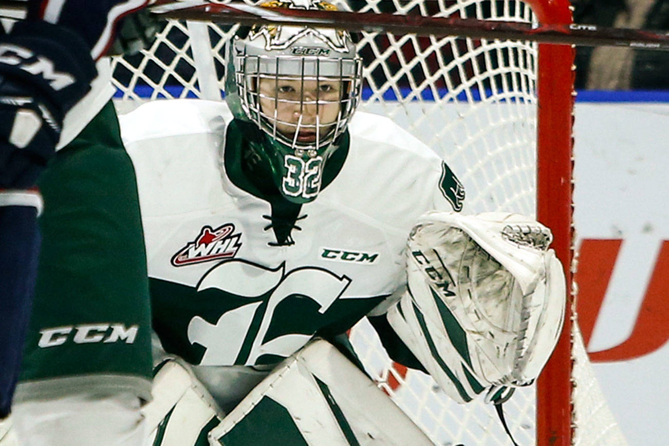 Silvertips goalie Dustin Wolf watches for the puck during the team’s 4-0 victory over the Tri-City Americans on Wednesday, Jan. 10, 2018 at Angel of the Winds Arena in Everett. (Ian Terry / The Herald)