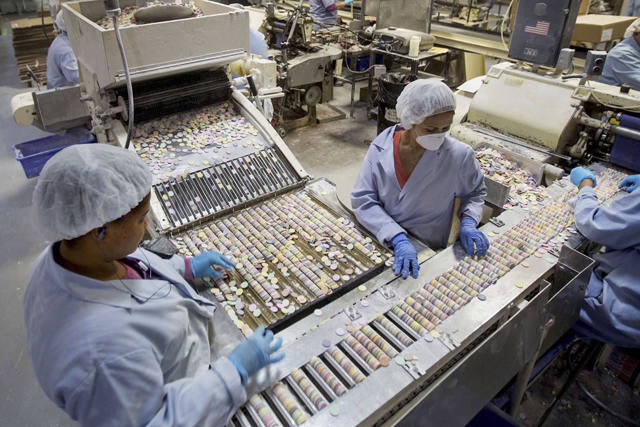 Workers sort Necco wafers at the factory in Revere, Massachusetts, in 2013. (Scott Eisen/Bloomberg)