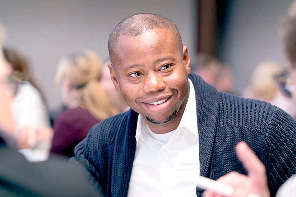 Andre Graham, director of South Everett Boys and Girls Club, takes part in a Summit 2038 discussion. (William Wright)
