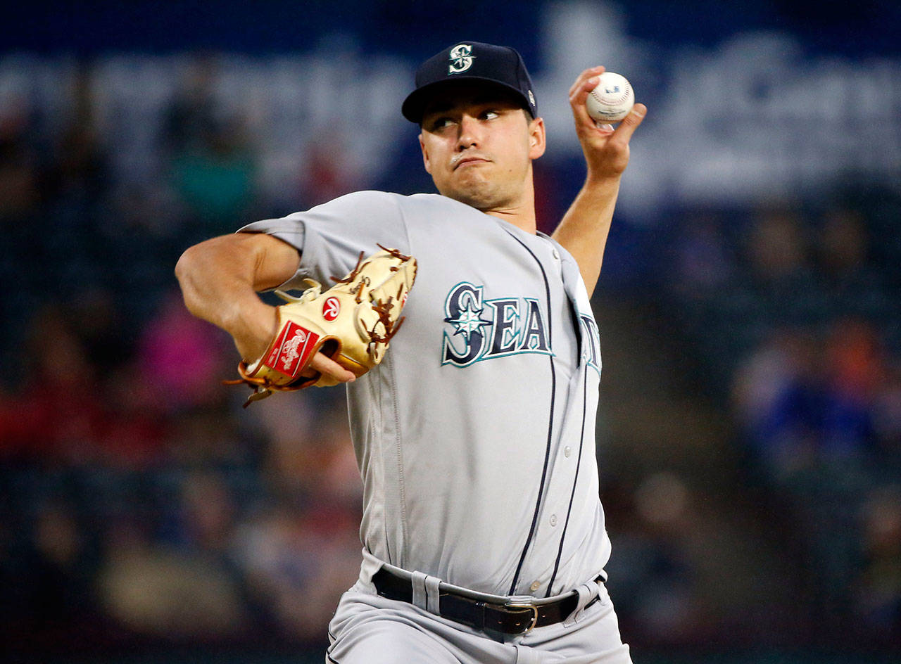 Mariners starting pitcher Marco Gonzales (32) throws during a game against the Rangers on Sept. 22, 2018, in Arlington, Texas. (AP Photo/Michael Ainsworth)