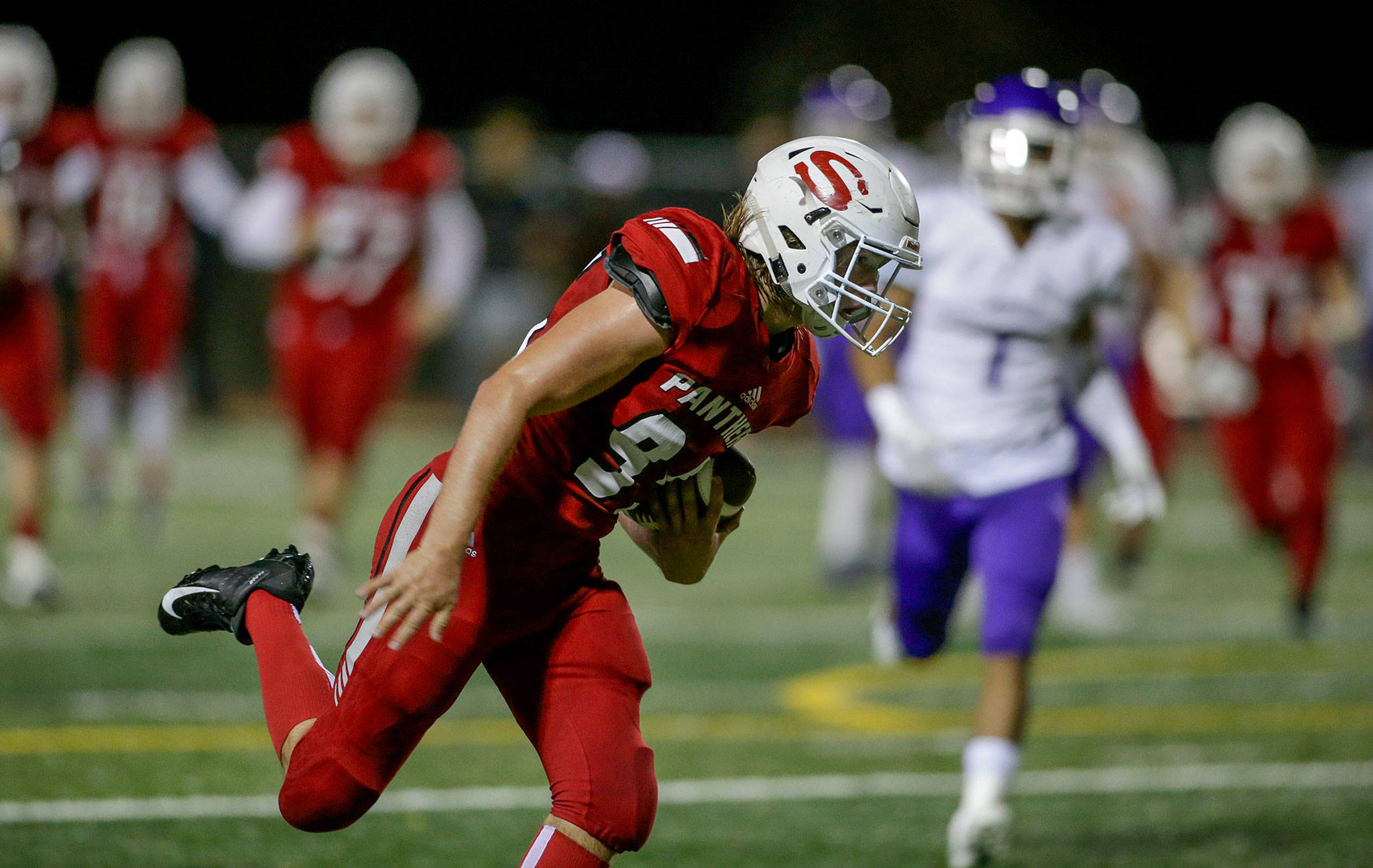 Snohomish’s Noah Dunham hauls in a pass for a touchdown during a Week 10 playoff game against Garfield on Nov. 2, 2018, at Veterans Memorial Stadium in Snohomish. Snohomish won 42-35. (Andy Bronson / The Herald)