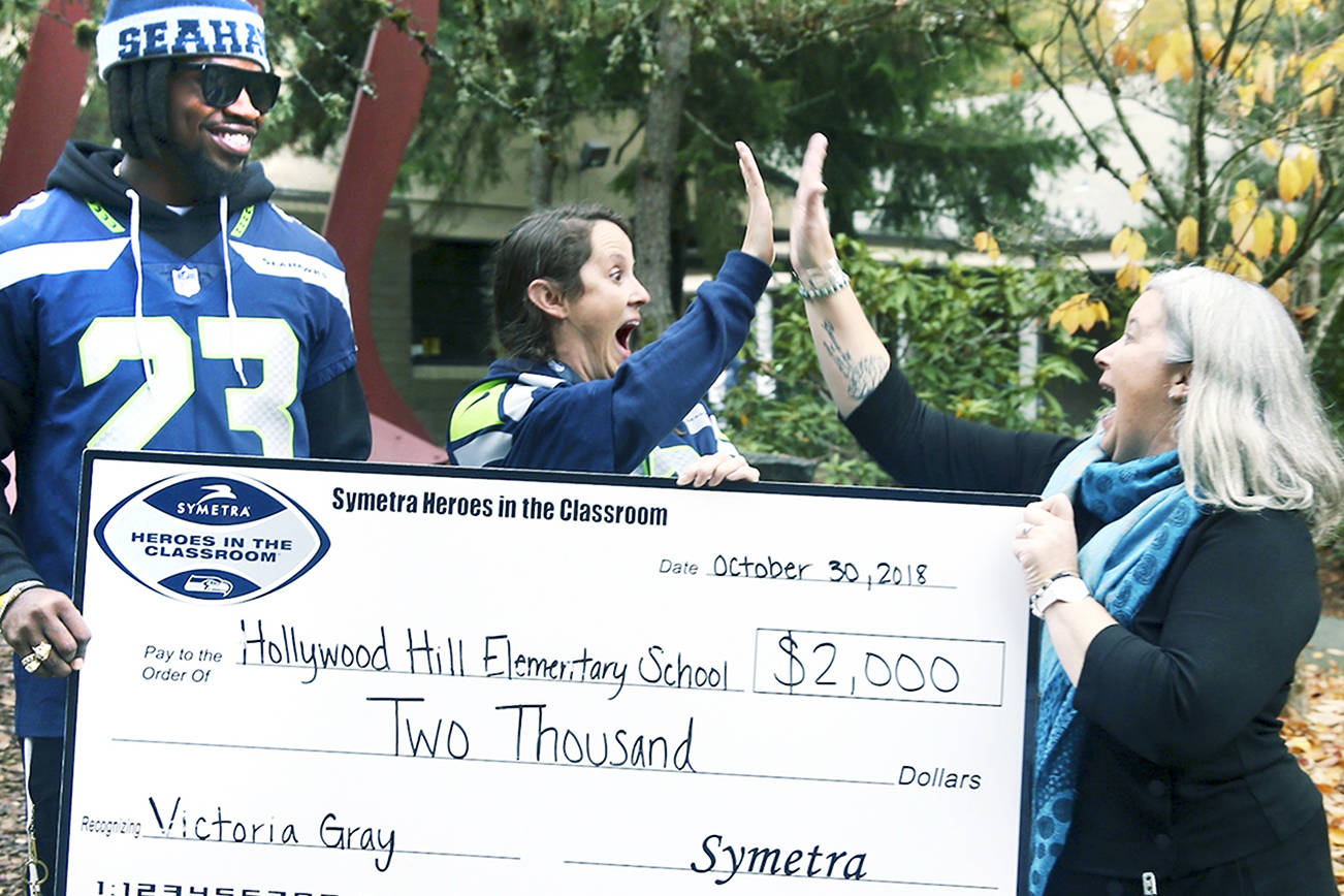 Northshore teacher gets surprise honor and Seahawk visit