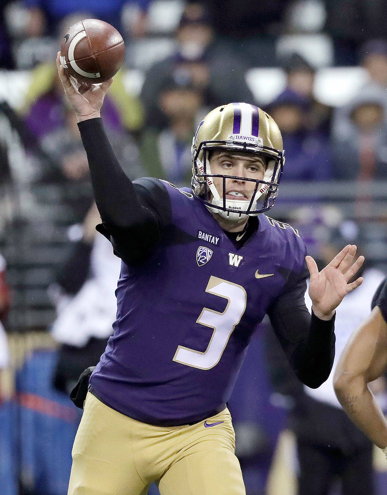 Washington quarterback Jake Browning throws during the first half of the Huskies’ 27-23 win over Stanford last Saturday in Seattle. (AP Photo/Elaine Thompson)