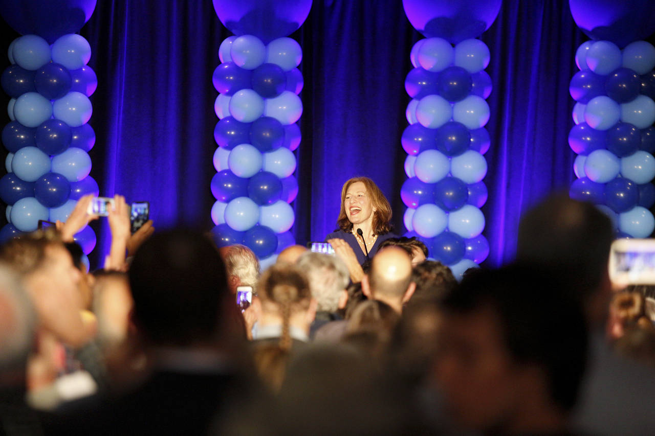 Candidate for U.S. Congress Dr. Kim Schrier speaks at the Washington State Democratic Party’s 2018 Election Night Watch Party at the Bellevue Hilton on Tuesday. (Andy Bronson / The Herald)