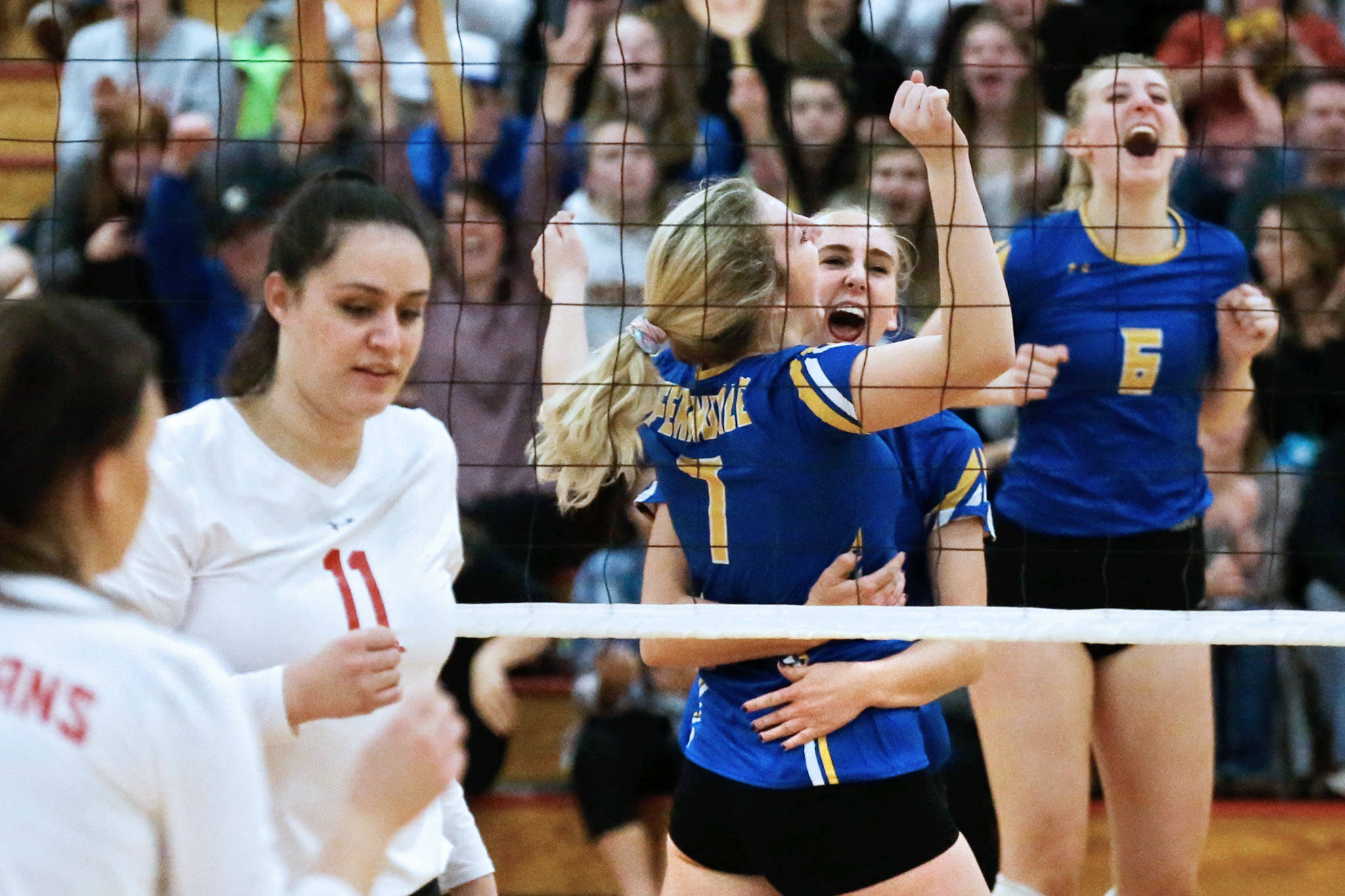 Ferndale celebrates a point against Stanwood on Thursday night at Marysville Pilchuck High School. Ferndale won in straight sets. (Kevin Clark / The Herald)