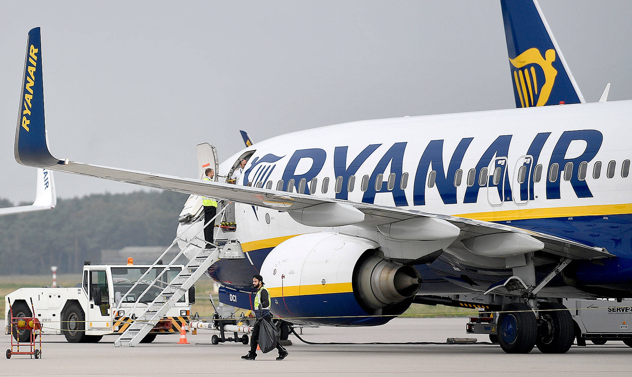A Ryanair Boeing 737 at an airport in Germany. French authorities have seized a a similar plane and forced 149 passengers to disembark because of a dispute over subsidies to the Irish airline. (AP Photo/Martin Meissner, file)