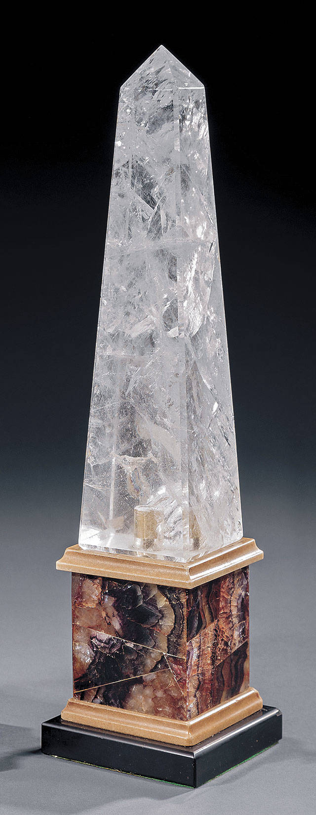 A pair of 15-inch high obelisks made of rare Blue John stone and rock crystal — only one is shown here — sold at a Neal Auction in New Orleans for $2,176. (Cowles Syndicate Inc.)