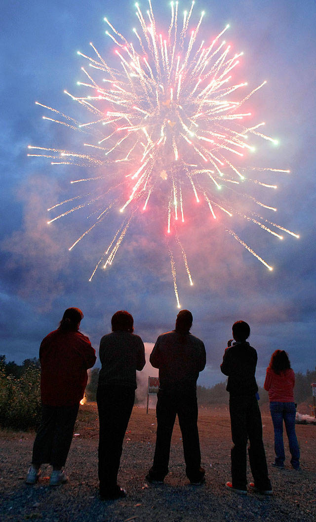 People watch fireworks at Boom City in Tulalip. Marysville plans to host a show next Fourt of July. (Sarah Weiser / Herald File)