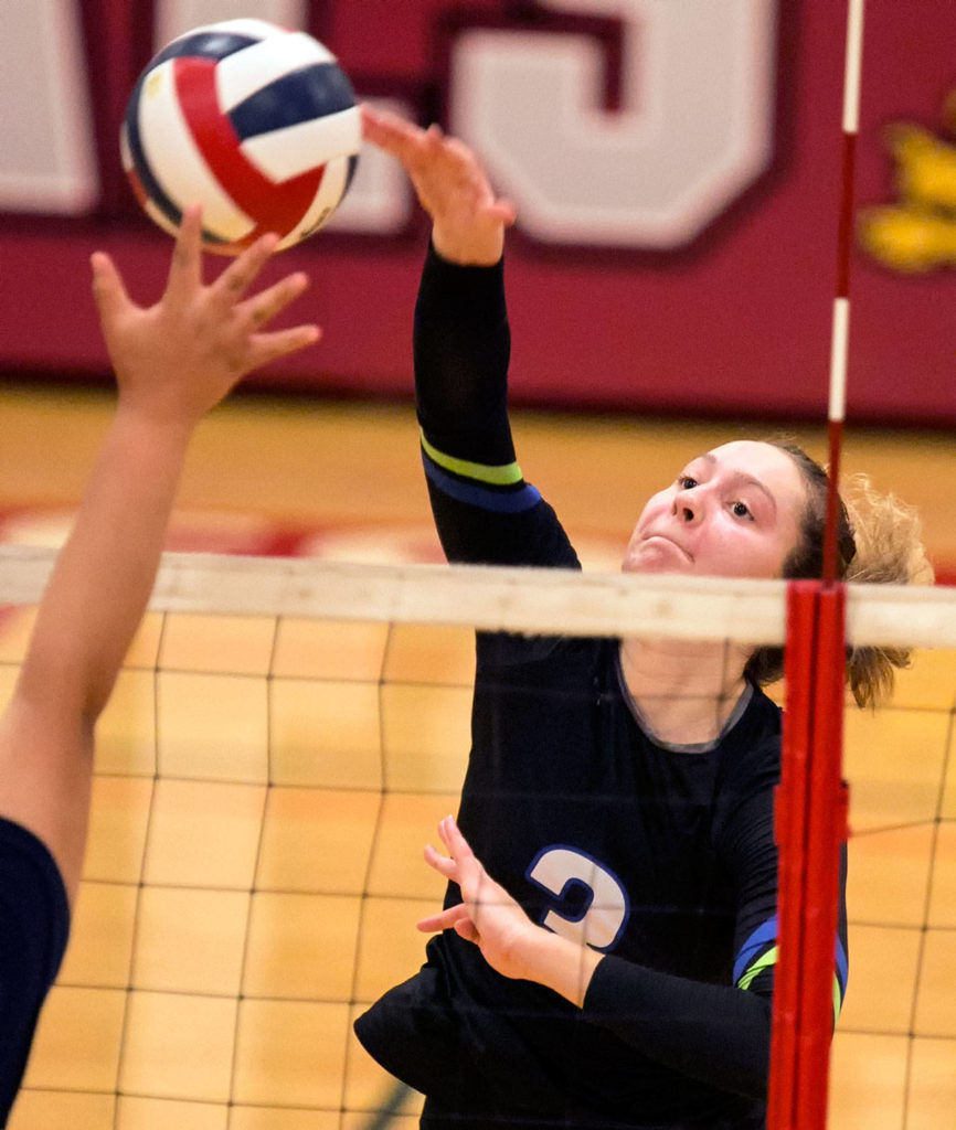 Edmonds Community Colleges Michelle Dmitruk hits a ball during an Oct. 31 match against Skagit Valley College in Mount Vernon. (Kevin Clark / The Herald)
