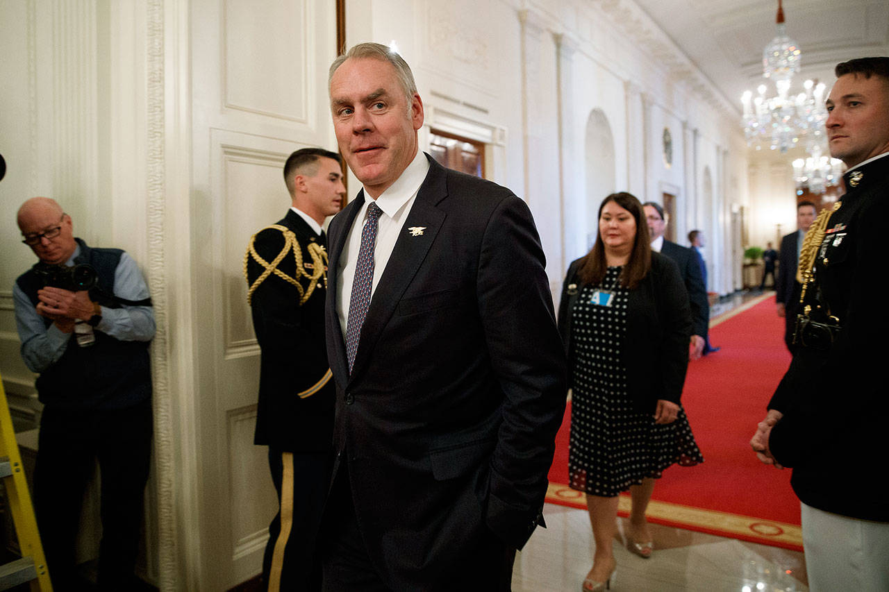 Secretary of the Interior Ryan Zinke arrives for an event with President Donald Trump on the opioid crisis in the East Room of the White House in Washington, D.C., on Oct. 24. Zinke says he’s “100 percent confident” no wrongdoing will be found in pending ethics investigations that have stirred speculation he could get ousted from Trump’s cabinet. (AP Photo/Evan Vucci, File)