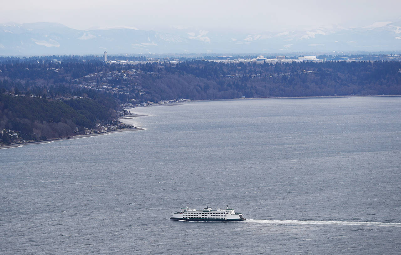 A Washington state ferry crosses Puget Sound near Seattle. (AP Photo/Ted S. Warren, file)