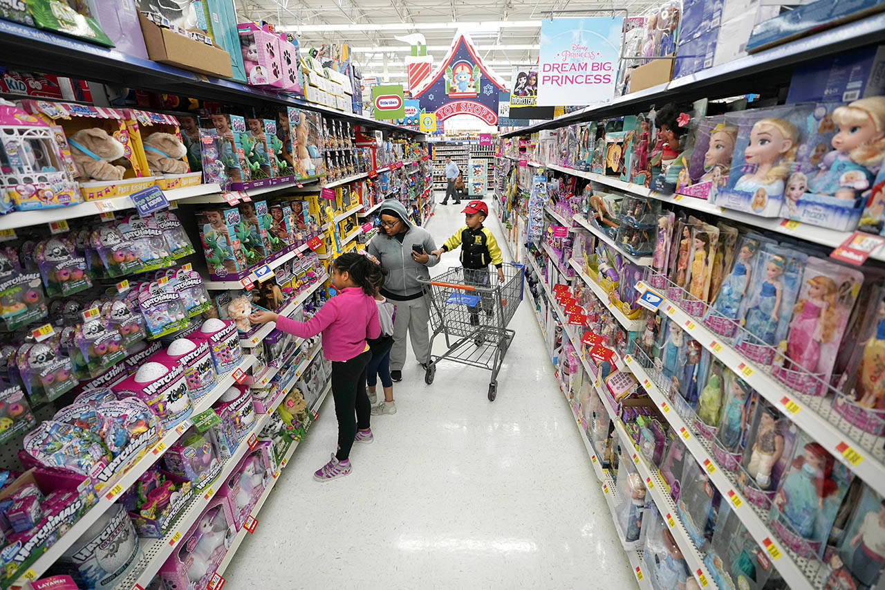 Shoppers look at toys at a Walmart Supercenter in Houston on Nov. 9. (AP Photo/David J. Phillip, File)