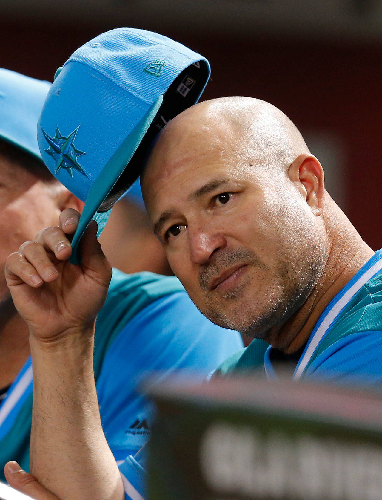 Seattle’s Manny Acta reacts to a play in the first inning of an Aug. 24 game in Phoenix. (AP photo / Rick Scuteri)