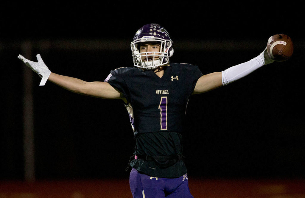 Lake Stevens’ Ian Hanson celebrates after his touchdown during a 4A state quarterfinal game against Graham-Kapowsin on Nov. 17, 2018, in Lake Stevens. (Olivia Vanni / The Herald)
