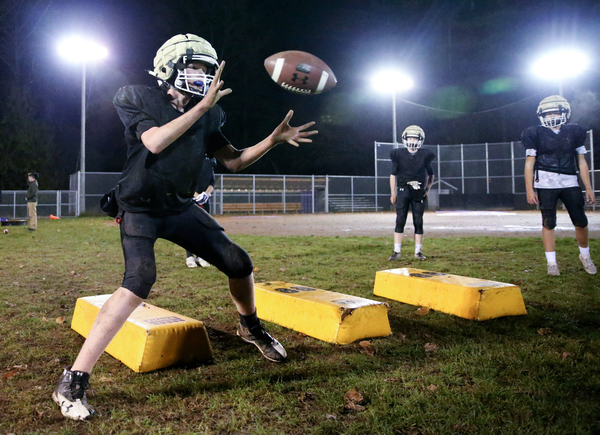 Connor Ewing of the U14 Lake Stevens Vikings runs through a drill during the team’s practice Thursday at the Lake Stevens Boys Girls Club. (Kevin Clark / The Herald)