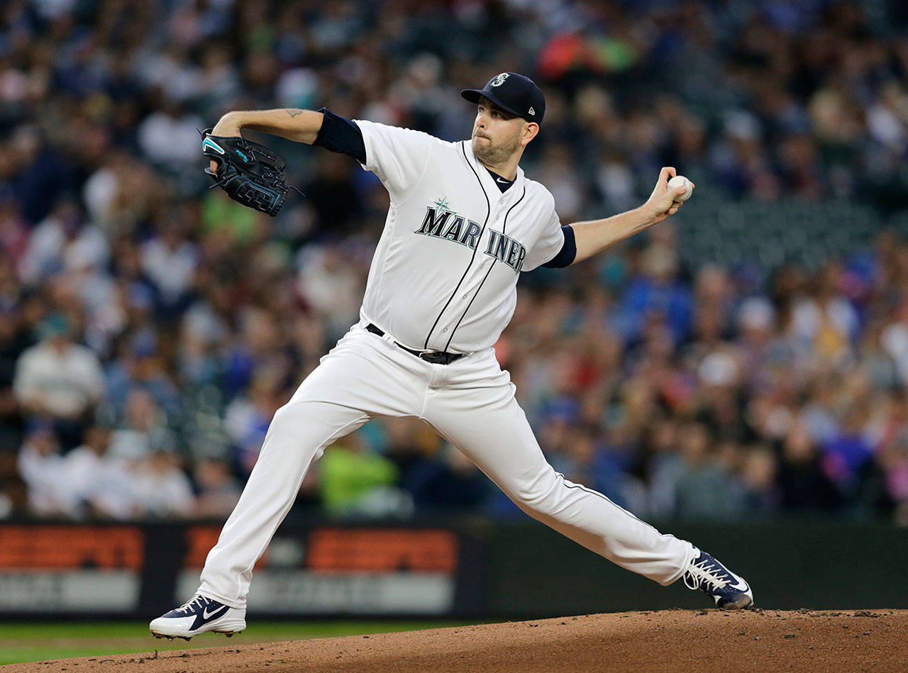 Former Seattle Mariners starting pitcher James Paxton works against the Texas Rangers during the first inning of a game on Sept. 29 in Seattle. The Mariners traded Paxton to the New York Yankees on Monday. (John Froschauer / Associated Press)