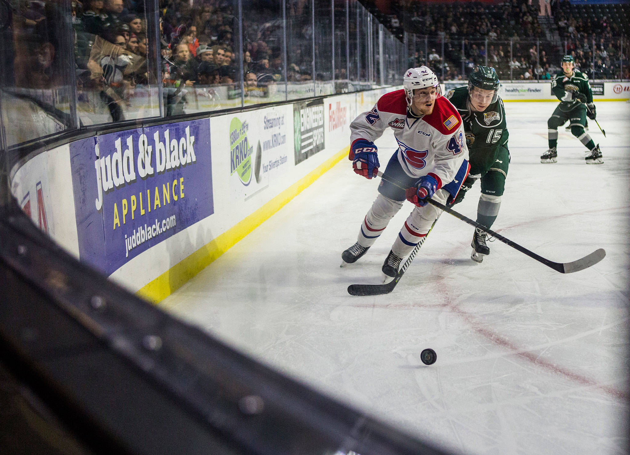 Slivertips’ Sean Richards and the Chiefs’ Egor Arbuzov skate after the puck during the game against the Spokane Chiefs on Sunday, Nov. 18, 2018 in Everett, Wa. (Olivia Vanni / The Herald)