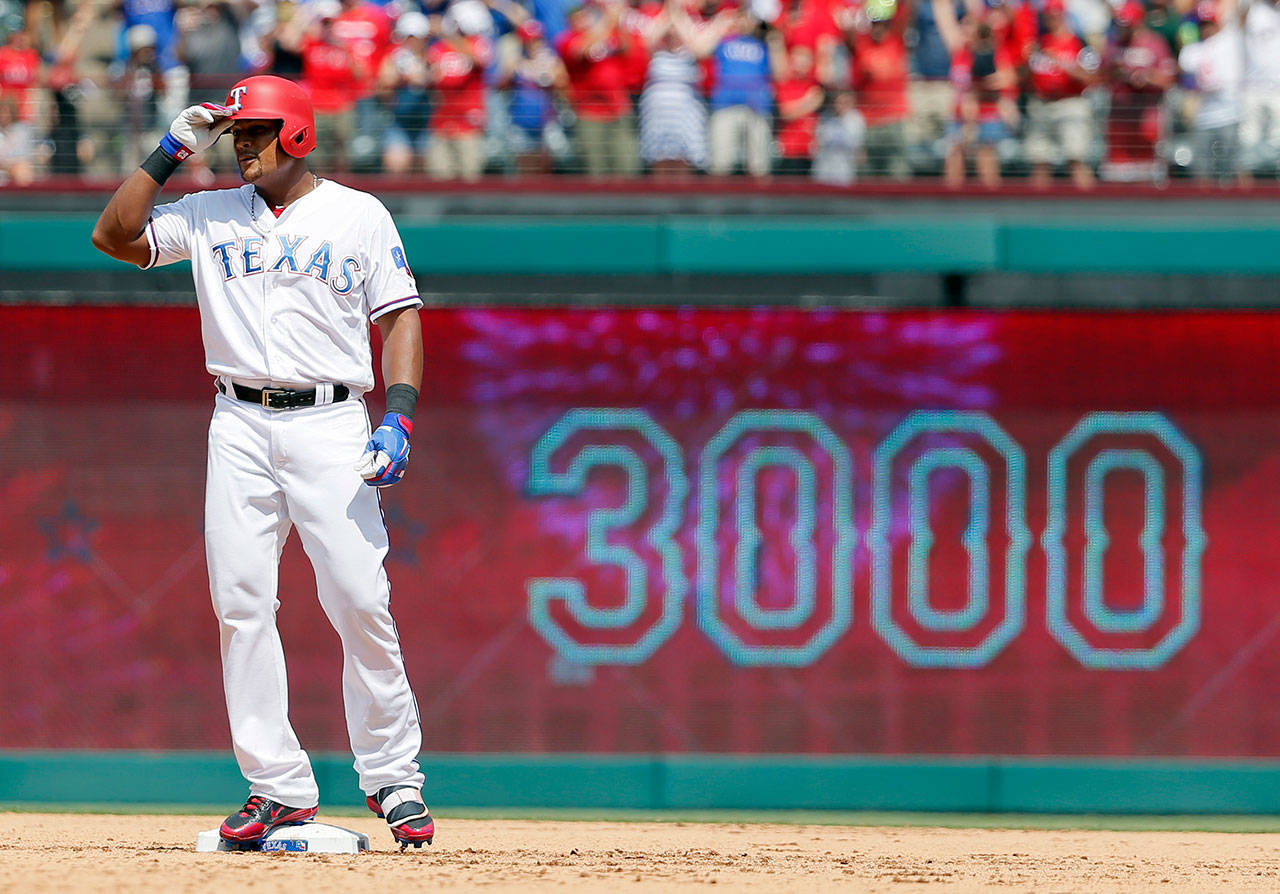 Adrian Beltre of the Texas Rangers acknowledges the fans after hitting a double for his 3,000th career hit on July 30, 2017, in Arlington, Texas. Beltre, who spent six years with the Seattle Mariners (2005-09), has decided to retire after 21 big-league seasons. (AP Photo/Tony Gutierrez, File)