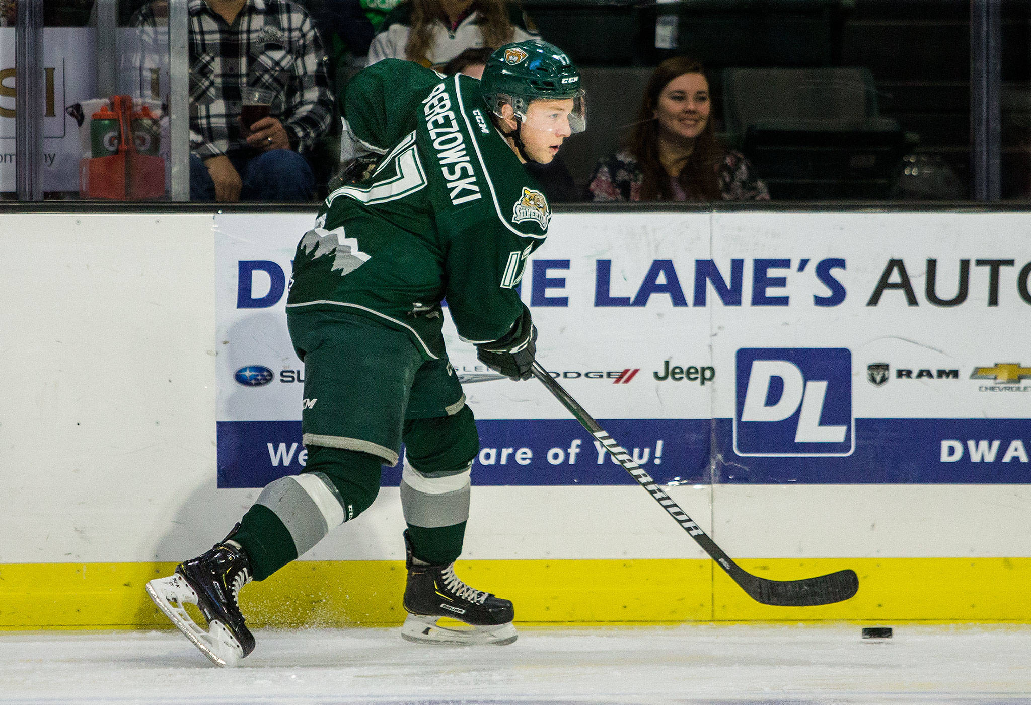 Everett Silvertips’ Jackson Berezowski skates after the puck during the game Sunday, Nov. 18, against the Spokane Chiefs at Angel of the Winds Arena in Everett. (Olivia Vanni / The Herald)