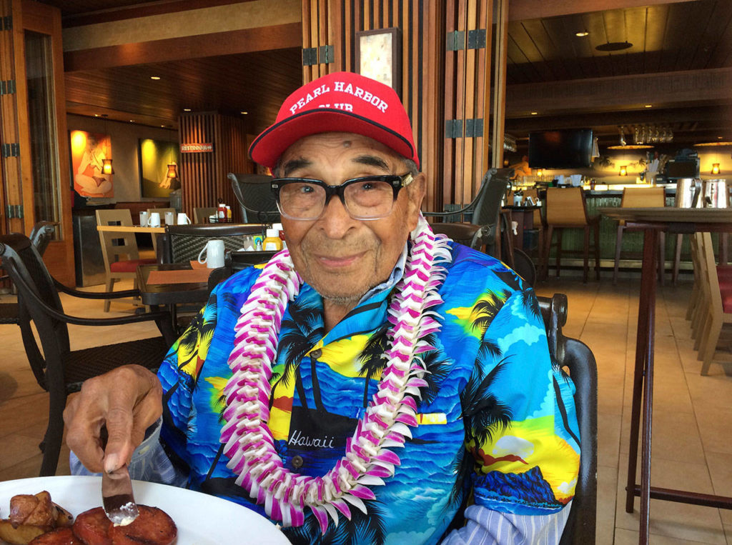 Ray Chavez, a Pearl Harbor survivor from Poway, California, poses for a photo as he was eating breakfast in Honolulu in 2016. Chavez, who died Wednesday, was out on a minesweeper in the early hours before the attack. (Audrey McAvoy / Associated Press file)
