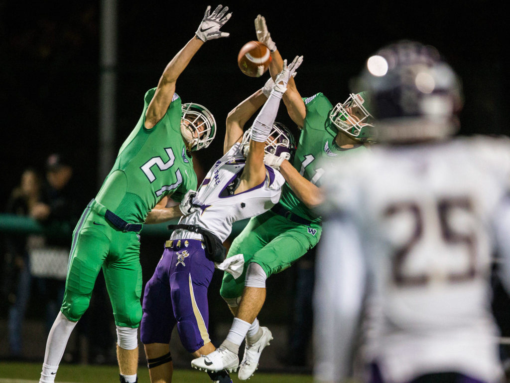A pass is blocked to Lake Stevens&rsquo; Ian Hanson during the Class 4A state state semifinal game against Woodinville at Pop Keeney Stadium on Saturday, Nov. 24, 2018 in Bothell, Wa. (Olivia Vanni / The Herald)
