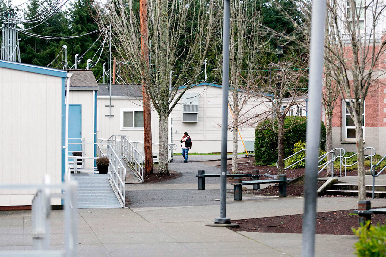 Everett School District’s Henry M. Jackson High School relies on 17 portable classrooms to serve a student population of 2,200 students at its Mill Creek campus. To address expected growth it would have to add 13 more portables by 2023, oro balance growth throughout the district, with some students moved south to Cascade High School and Everett High School (Kevin Clark / Herald file photo)