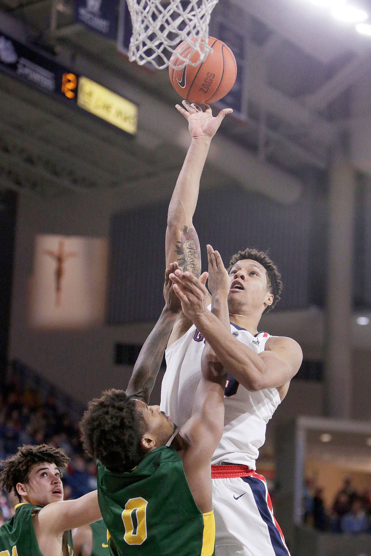 Gonzaga’s Brandon Clarke (right) shoots while defended by North Dakota State’s Vinnie Shahid during a Nov. 26 game in Spokane. (AP Photo/Young Kwak)