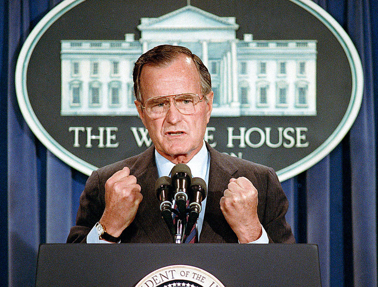 U.S. President George H.W. Bush holds a news conference at the White House in Washington in 1989, where he condemned the Chinese crackdown on pro-democracy demonstrators in Beijing’s Tiananmen Square. Bush died at the age of 94 on Friday, about eight months after the death of his wife, Barbara Bush. (Marcy Nighswander / AP file)