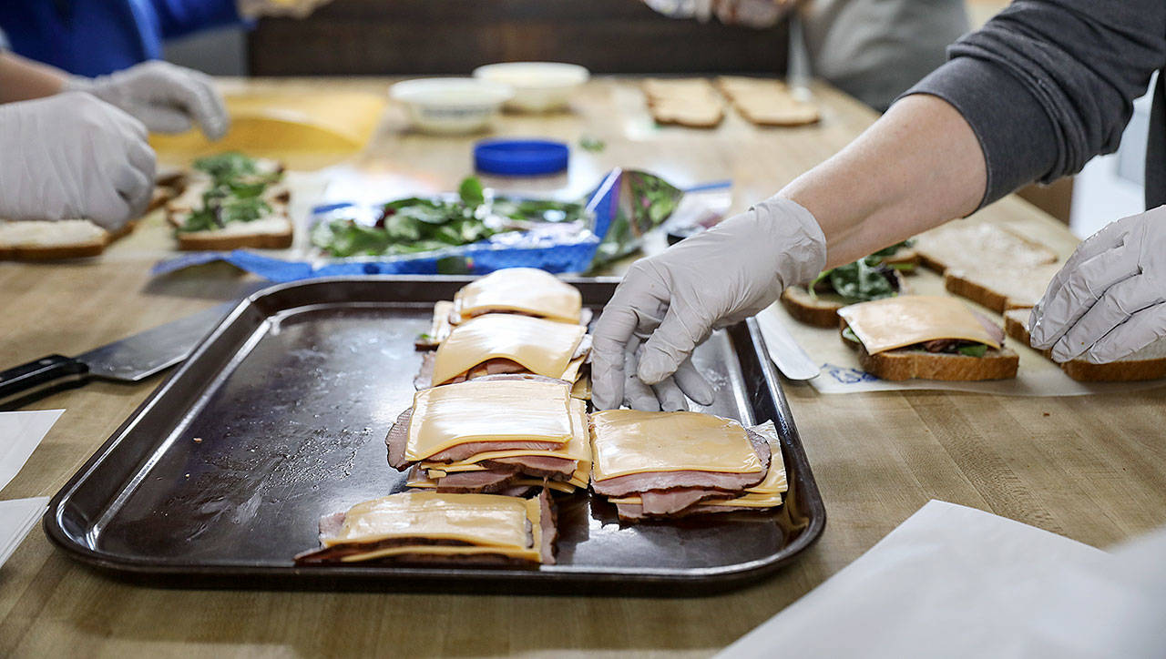 “If the need is there we want to be there,” said Virginia Hatch, who has helped organize the packing of the lunches for years. (Lizz Giordano / The Herald)