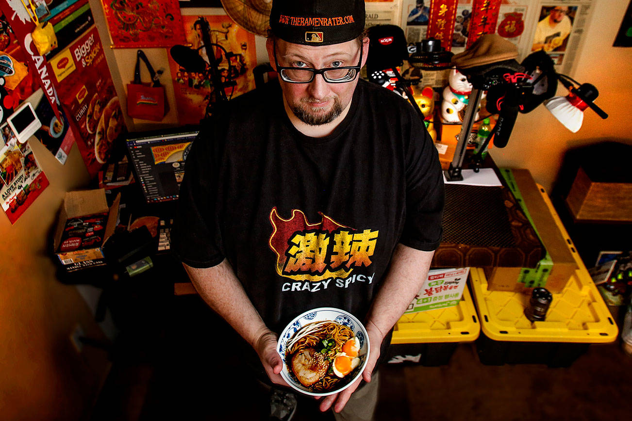 Former Edmonds resident Hans Lienesch, aka the Ramen Rater, has gained fame throughout the Pacific Rim as a connoisseur of prepackaged instant noodles. (Dan Bates / The Herald)
