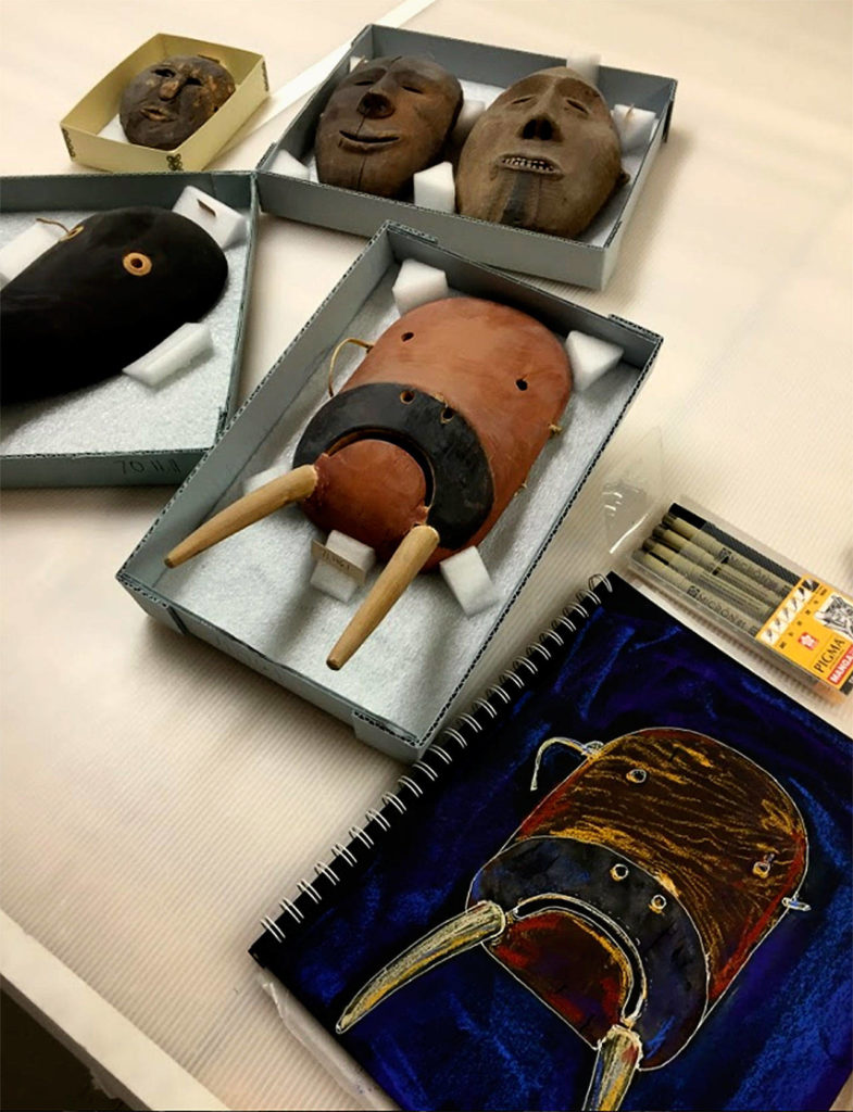 A drawing (right) by Susan Ringstad Emery depicts ceremonial walrus and raven masks she studied at the Anchorage Museum.
