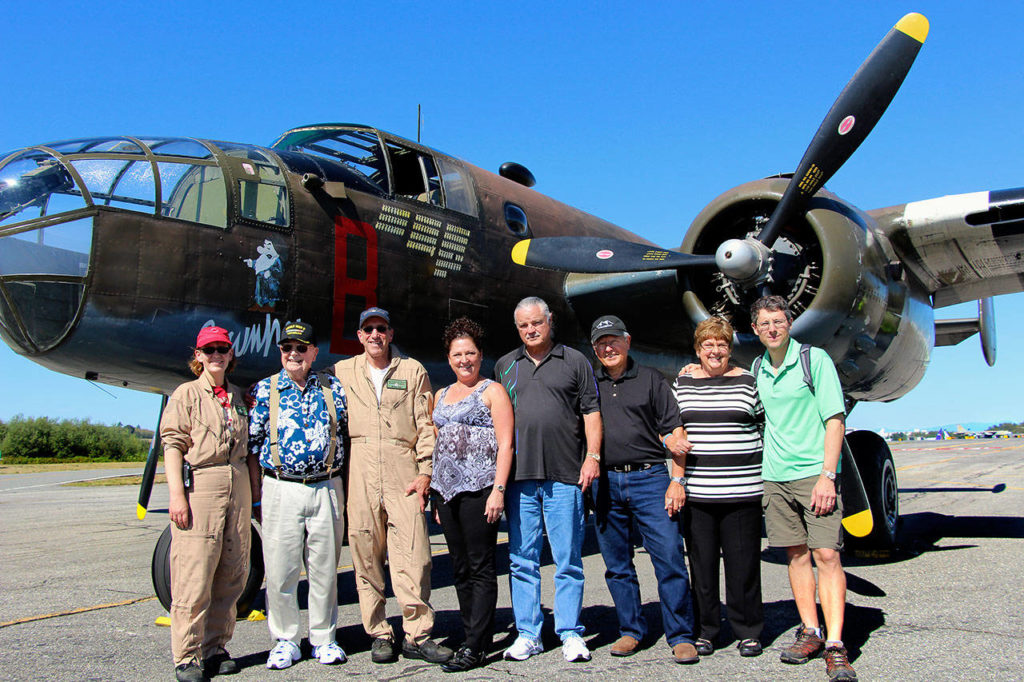 World War II flier Ralph Lower and his family (he’s second from left) took a ride a few years ago aboard “Grumpy,” a restored B-25 Mitchell bomber that’s part of the Historic Flight Foundation collection at Paine Field. Lower, who died Nov. 24, flew 52 missions on a B-25 between July 1942 and September 1943. (Courtesy Rod and Sandra Raguso)
