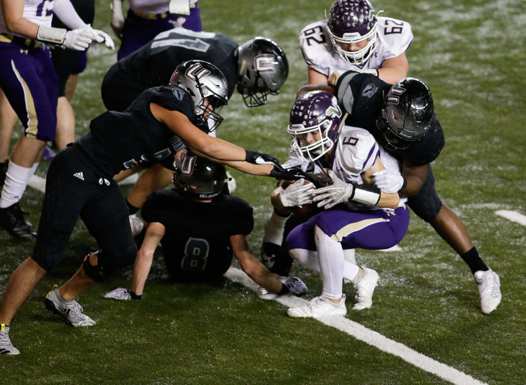 Lake Stevens running back Dallas Landeros rolls in for a touchdown during the first half of the 4A state football championship game against Union on Dec. 1, 2018, at the Tacoma Dome. (Andy Bronson / The Herald)
