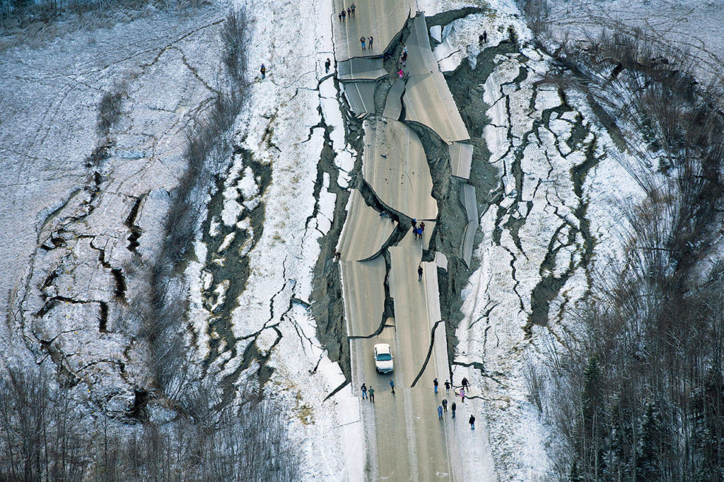 This aerial photo shows damage on Vine Road, south of Wasilla, Alaska, after earthquakes Friday. (Marc Lester/Anchorage Daily News via AP)
