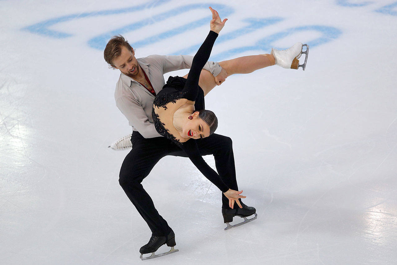 Kaitlin Hawayek and Jean-Luc Baker, of Edmonds, compete in Ice Dance Rhythm during the ISU figure skating France’s Trophy on Nov. 23, 2018, in Grenoble, French Alps. (AP Photo/Francois Mori)