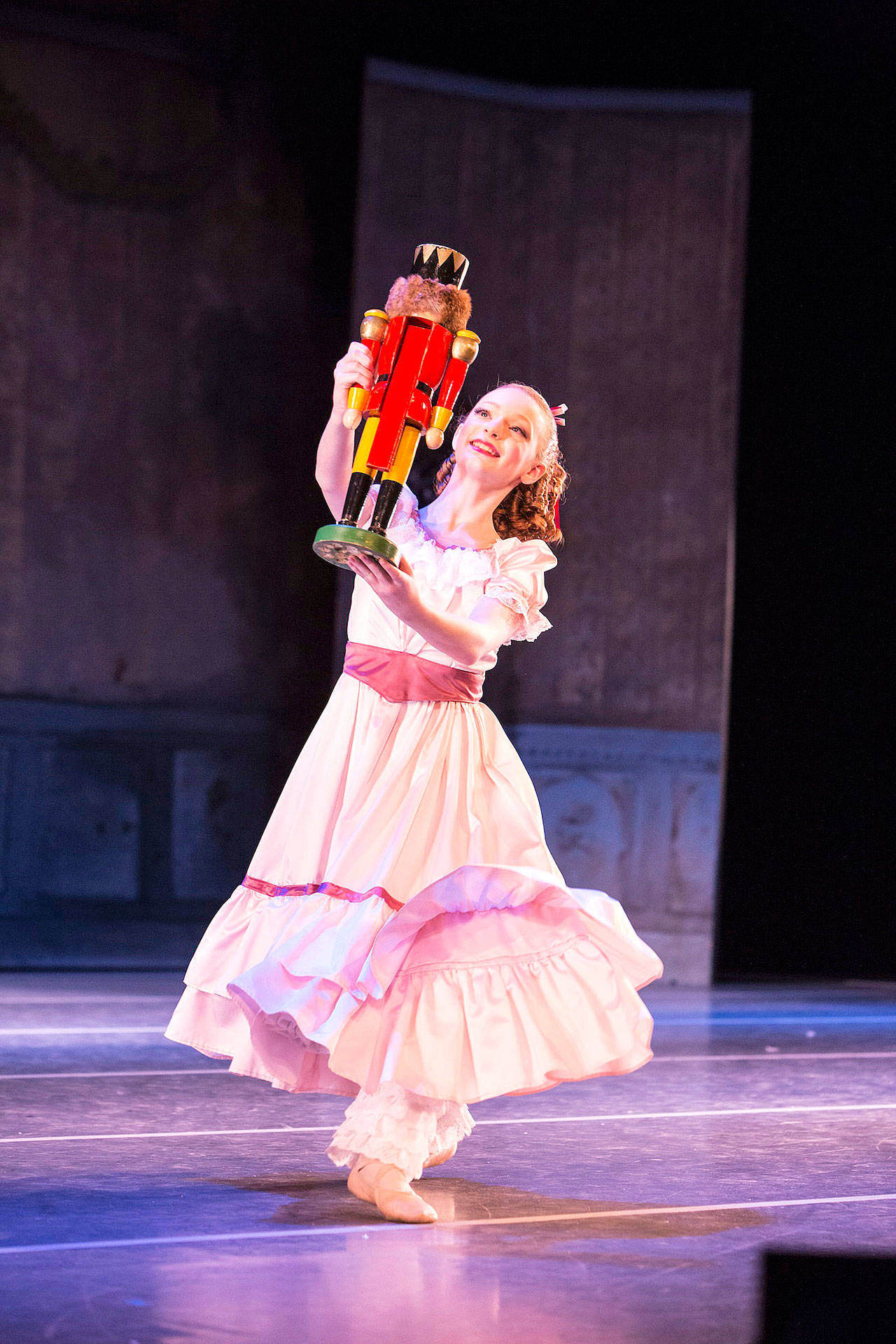 Clara dances with her new Nutcracker doll in Olympic Ballet Theatre’s annual production of “The Nutcracker” in 2014. The ballet will be presented in Everett and Edmonds. (Olympic Ballet Theatre)