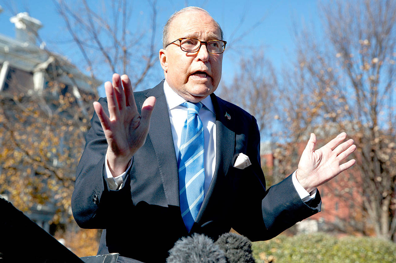 White House chief economic adviser Larry Kudlow talks with reporters about the status of trade negotiations with China. (Associated Press / Evan Vucci)