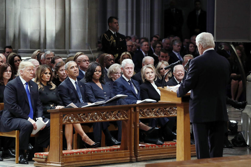 From left, President Donald Trump, first lady Melania Trump, former President Barack Obama, Michelle Obama, former President Bill Clinton, former Secretary of State Hillary Clinton, and former President Jimmy Carter listen as former Canadian Prime Minister Brian Mulroney speaks during a State Funeral at the National Cathedral on Wednesday in Washington, for former President George H.W. Bush. (AP Photo/Alex Brandon, Pool)
